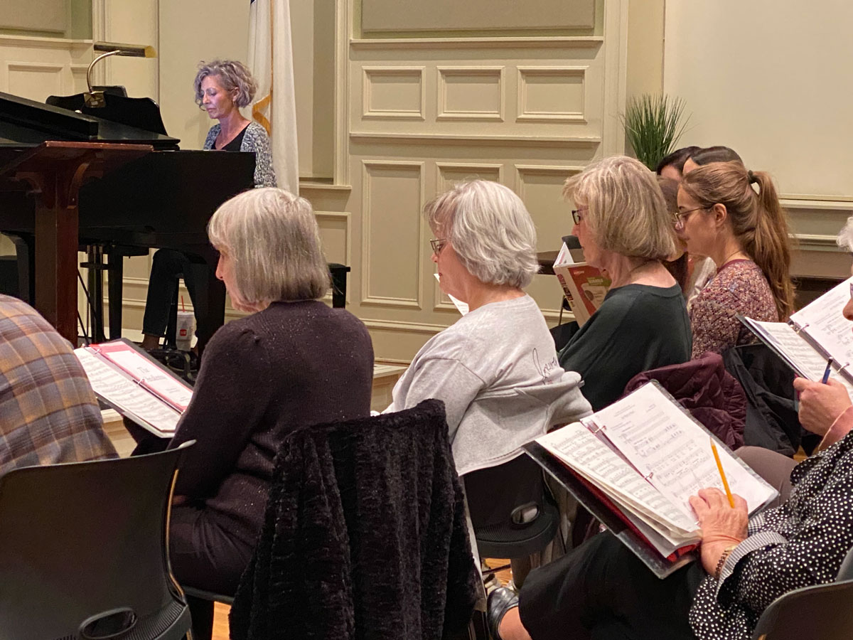 Rehearsal in Clayton Hall with Mitzi playing