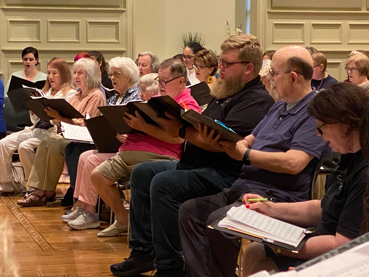 Basses and Sopranos rehearsing in Clatyon Hall